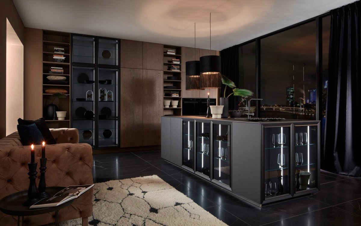 NOT CHILD'S PLAY: ANTI - FINGERPRINT FINISH, BLACK AND GLASS CHARACTERISE THIS KITCHEN