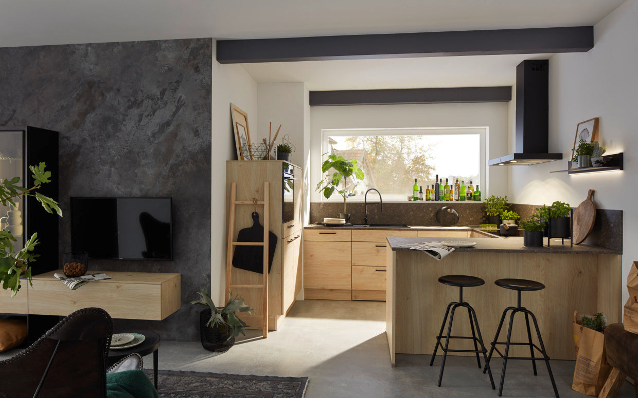 Spacious kitchen in wood and stone