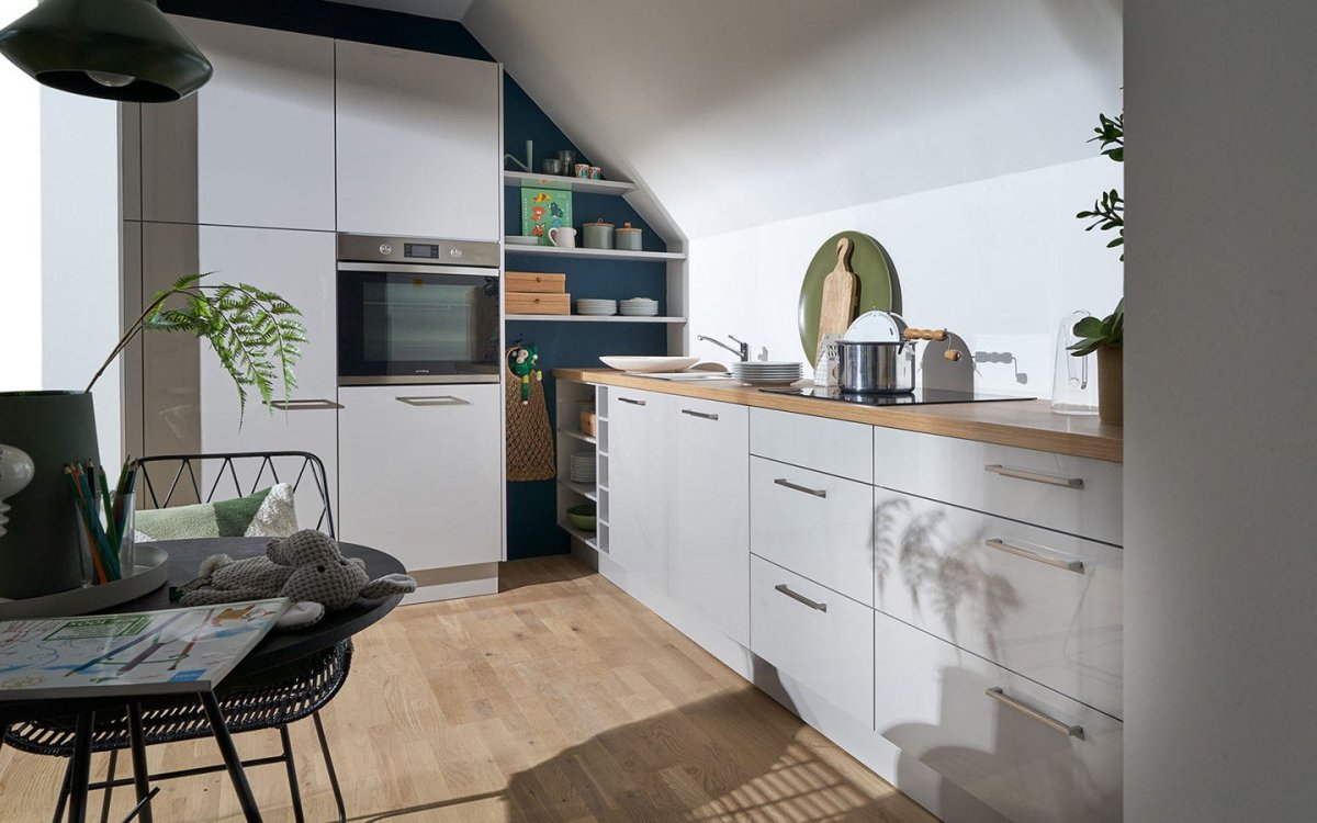 Kitchen under a sloping ceiling: functional and stylish - aksesuardesign