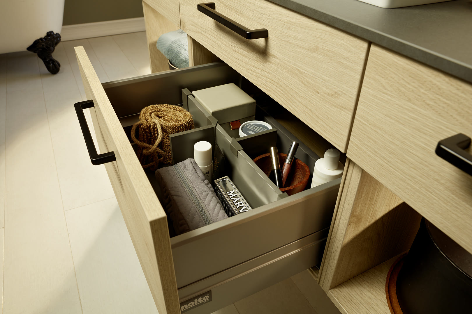 Bathroom with Artwood fronts in natural knotty oak.