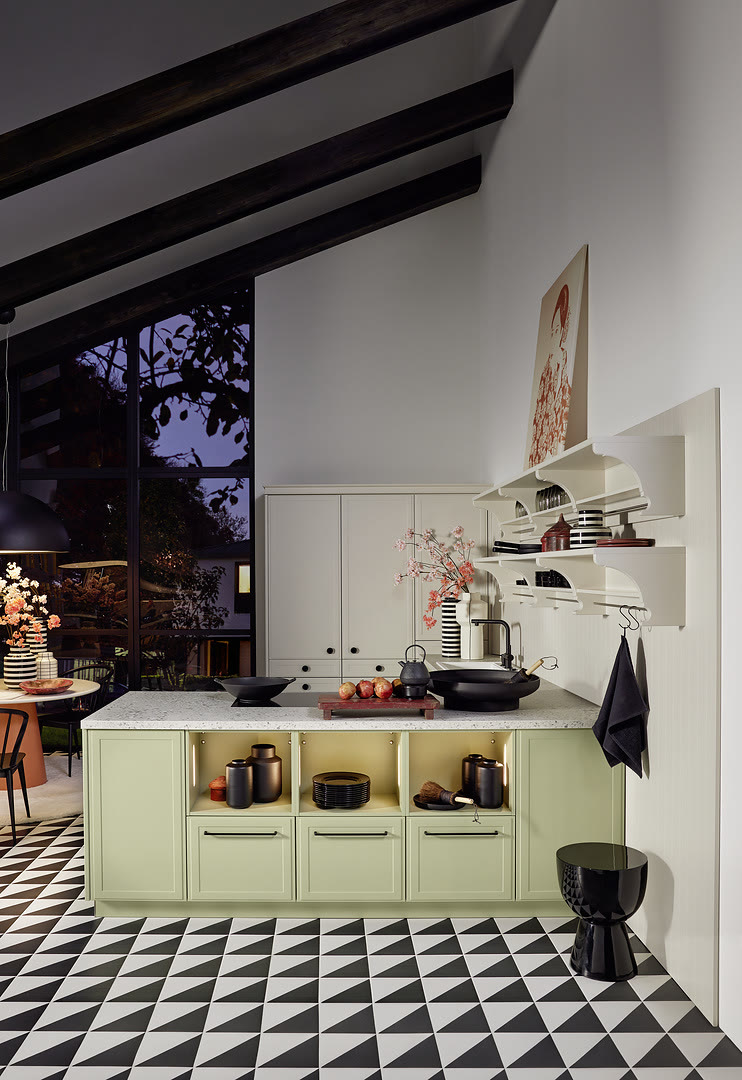 Kitchen with Torino Lack fronts in avocado soft-matt and cashmere soft-matt.
