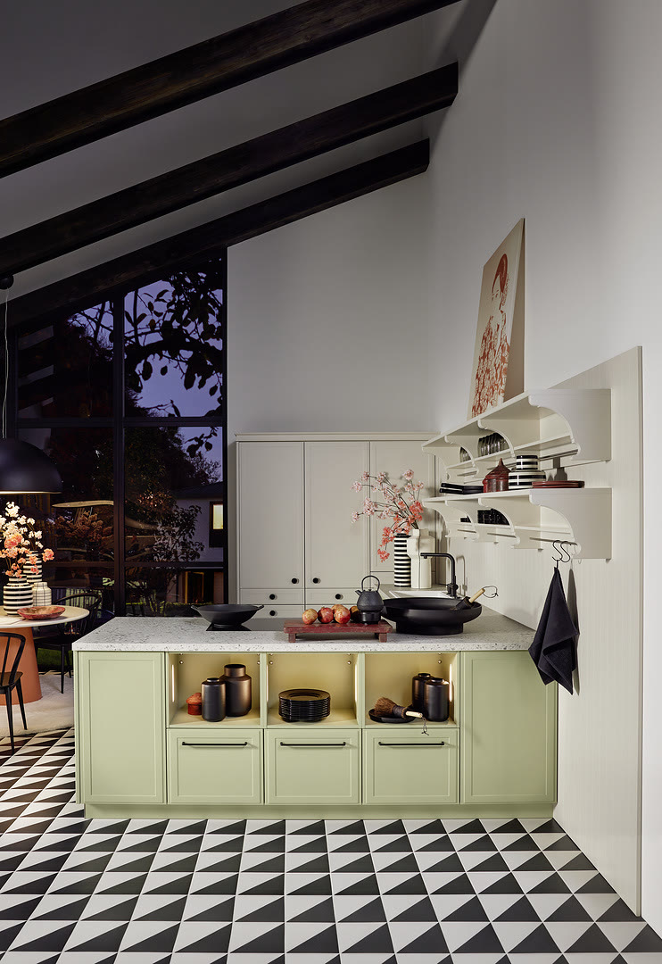 Kitchen with Torino Lack fronts in avocado soft-matt and cashmere soft-matt.