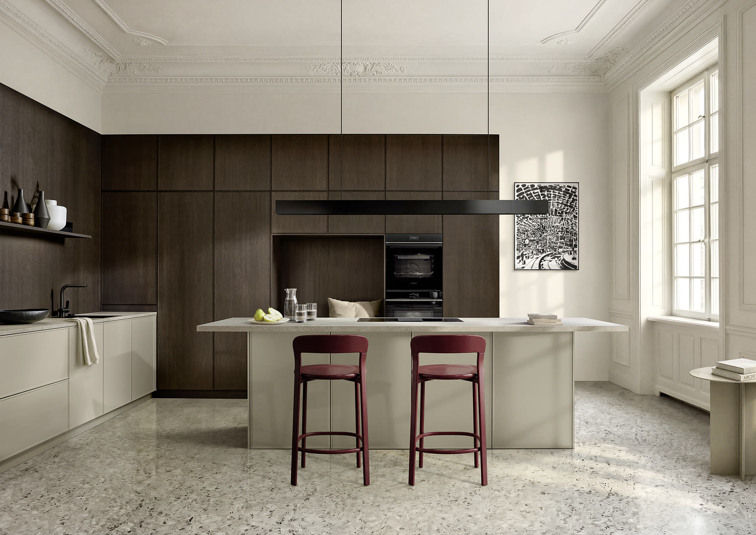 Finished kitchen with white perimeter cabinets, a dark wood back wall, and a white waterfall island with stools.