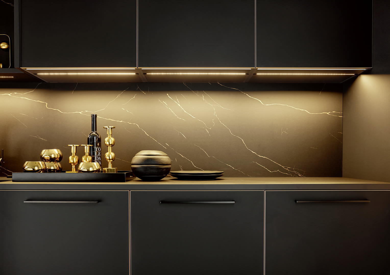 Kitchen with Flair fronts in black with a brass look.